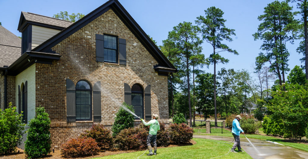 Image of patriot exterior restoration pressure washing a house in columbia